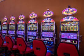 Diverse casino game collection displayed on mobile device screen with colorful interface